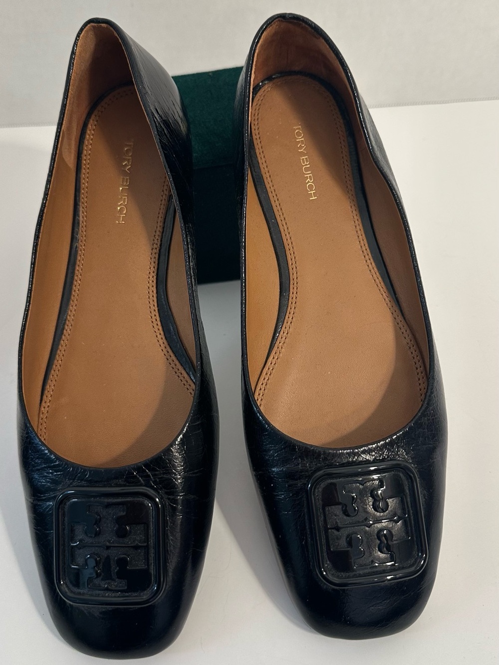 Tory Burch Black Leather Square-Toe Logo Flats 
Only worn a few times